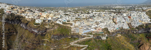 Grand Panoramic Aerial of Fira Village and the Caldera Rim