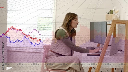 Woman reaching for keys, typing in home office, revealing graph overlay to analyze business data