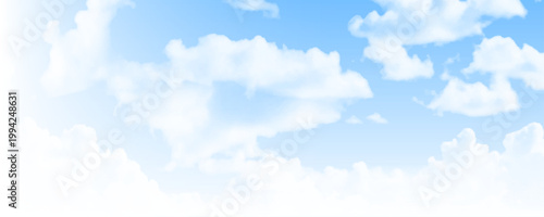 Wide panorama of bright blue sky and soft white clouds