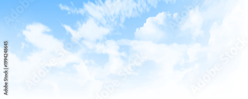 Clear blue sky with light wispy clouds on a sunny day. Atmospheric blue sky with clouds for nature or weather concept
