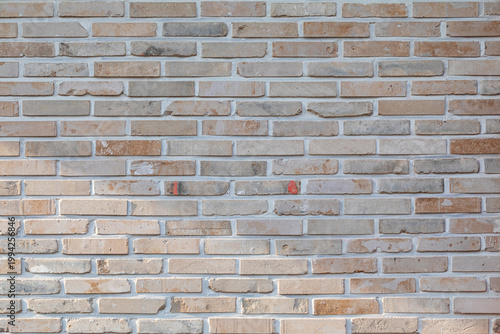 Old vintage light brown brick wall background texture