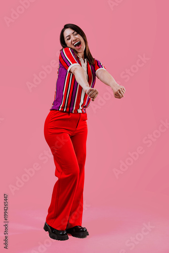 Enthusiastic woman celebrating success with joyful energy