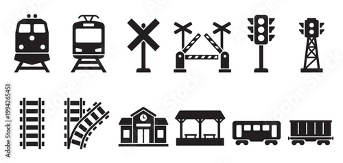 A collection of black and white silhouette icons representing various train elements including locomotives, tracks, station, and crossing signals.