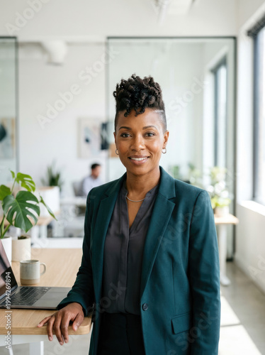 Confident Businesswoman in Blazer Standing in Modern Office Interior for Startup Success and Career Growth