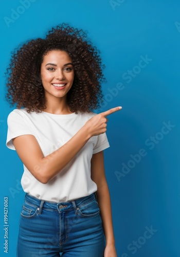 woman pointing to the side with a smile on her face