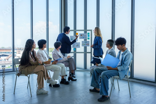 Successful happy workers Group of business people with Multiethnic workers with in company workers Group of asian business people and support Teamwork in the meeting room at modern office.