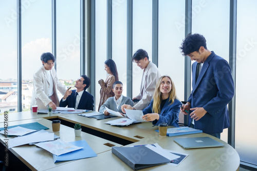 Successful happy workers Group of business people with Multiethnic workers with in company workers Group of asian business people and support Teamwork in the meeting room at modern office.