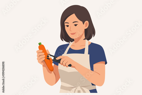 Woman peeling carrot with a peeler, preparing healthy vegetable food for cooking in kitchen