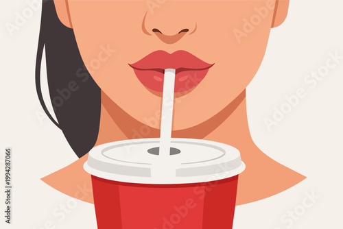 Woman drinking a refreshing soft drink through a straw from a red disposable cup, quenching thirst