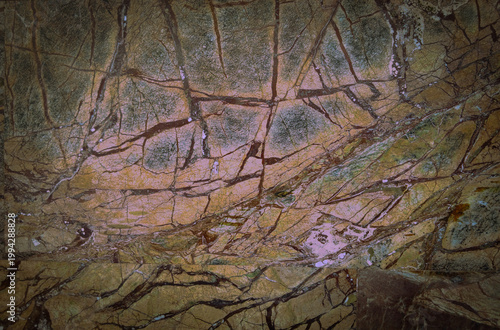 Abstract multicolor background with pink color and texture reminiscent of natural stone.