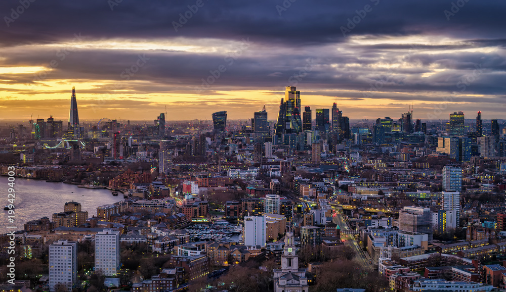 Fototapeta premium The London skyline with City skyscrapers and Thames River during dusk, United Kingdom