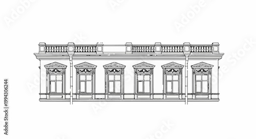 Ornate building facade with symmetrical windows and detailed railing on top