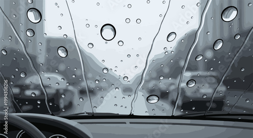 Driving through town on a rainy day with water droplets on the windshield