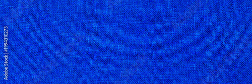 Fotografie Bright blue fabric texture featuring smooth and even surface with visible weave