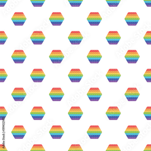 Hexagonal pop it fidget toys creating a seamless rainbow pattern