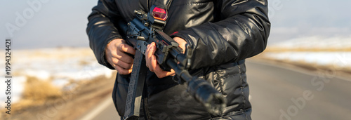 Foto Terrorist Criminal Holding Weapon in Hand