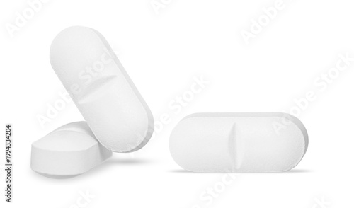 Three white oblong pills with score marks isolated on transparent background