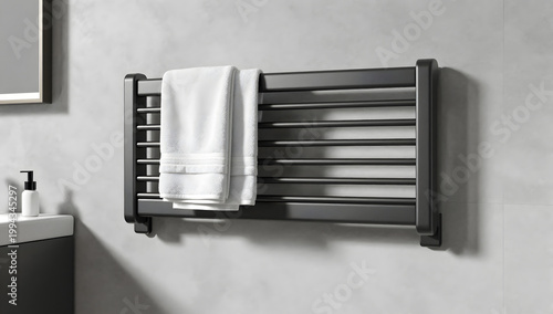 Towel Warmer in Modern Bathroom: A modern bathroom scene showcases a sleek, black towel warmer with a pristine white towel, embodying luxury and functionality. 