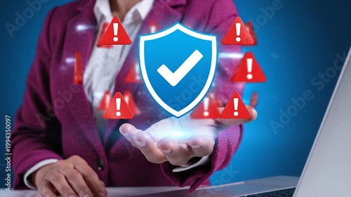Business professional ensuring cybersecurity with shield icon on digital screen
