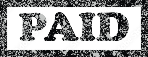 Vintage 'paid' stamp a textured black and white financial confirmation