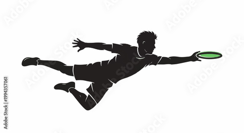 Dynamic silhouette of a person leaping to catch a green disc