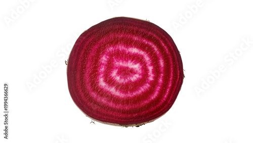 Photos Sliced vibrant red beet revealing concentric rings and root end