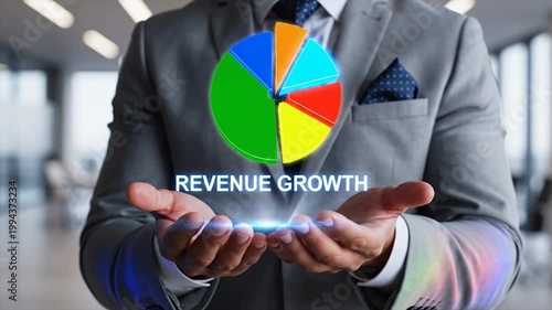 Business professional holding glowing revenue growth pie chart in modern office