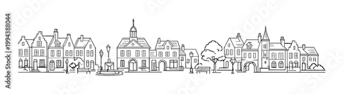 Town houses and central fountain along village street square