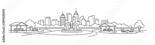 Park fountain with pavilions and city skyline in background