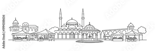 Mosque with twin minarets and fountain in market square