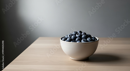 A Beautifully Arranged Breakfast Still Life Featuring Fresh Berries on a Rustic Wooden Table