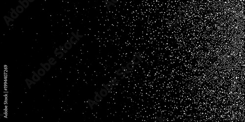 Dense scattering of small white dots against a black background