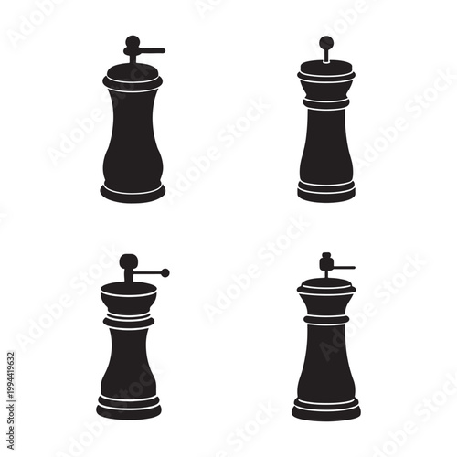 Four black pepper mills in different positions on white background kitchen utensils for seasoning food
