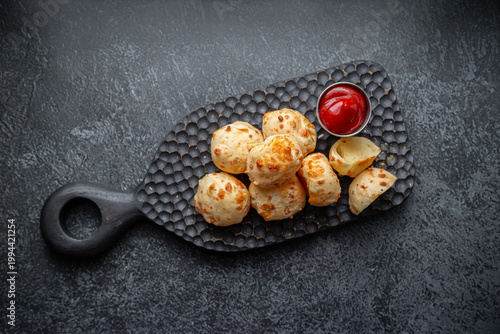 Cheese balls with sauce. Fried cheese.