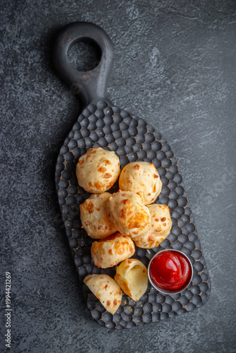 Cheese balls with sauce. Fried cheese.