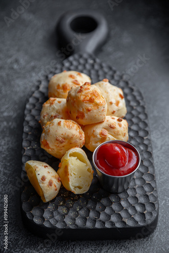 Cheese balls with sauce. Fried cheese.