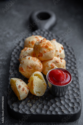 Cheese balls with sauce. Fried cheese.