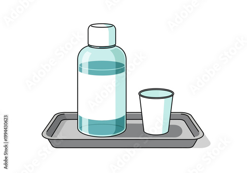 A bottle and a glass are placed on a tray indoors.