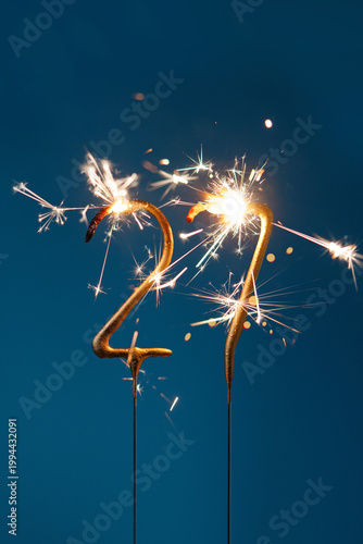 Konstfotografi 27 years celebration festive background with copy space made with Bengal fires in the form of number Twenty seven