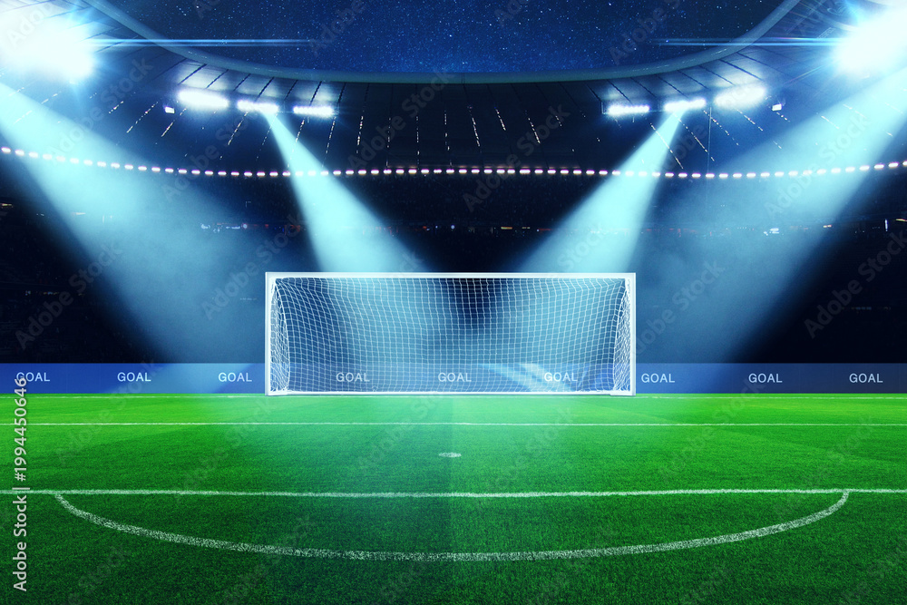 Fototapeta premium professional football goal stands empty on a lush green pitch under powerful stadium spotlights at night. Sporty win atmosphere with lens flares and a starry sky. world cup, concept. Creative sport