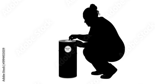 Silhouette of a Person Interacting with a Trash Can Outdoors.