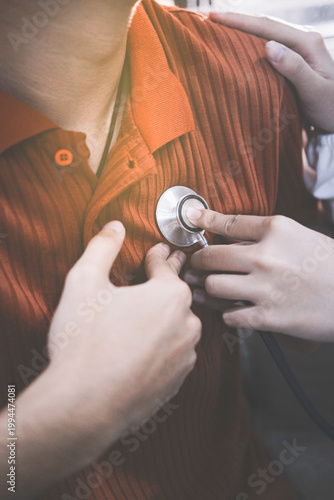 Doctor using a stethoscope checking patient with examining, presenting results symptom and recommend treatment method, Healthcare and medical concept