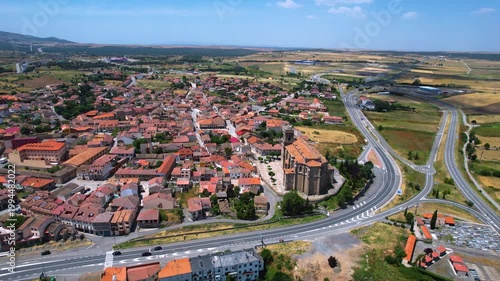 A panoramic aerial view of the old town and city Villacastín in the country of spain on a sunny summer noon.