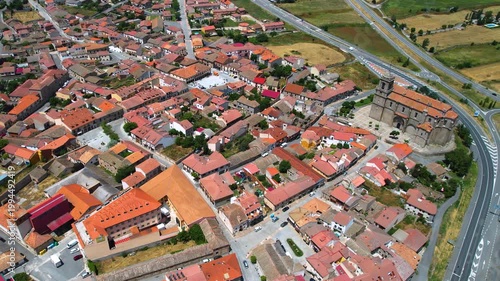 A panoramic aerial view of the old town and city Villacastín in the country of spain on a sunny summer noon.