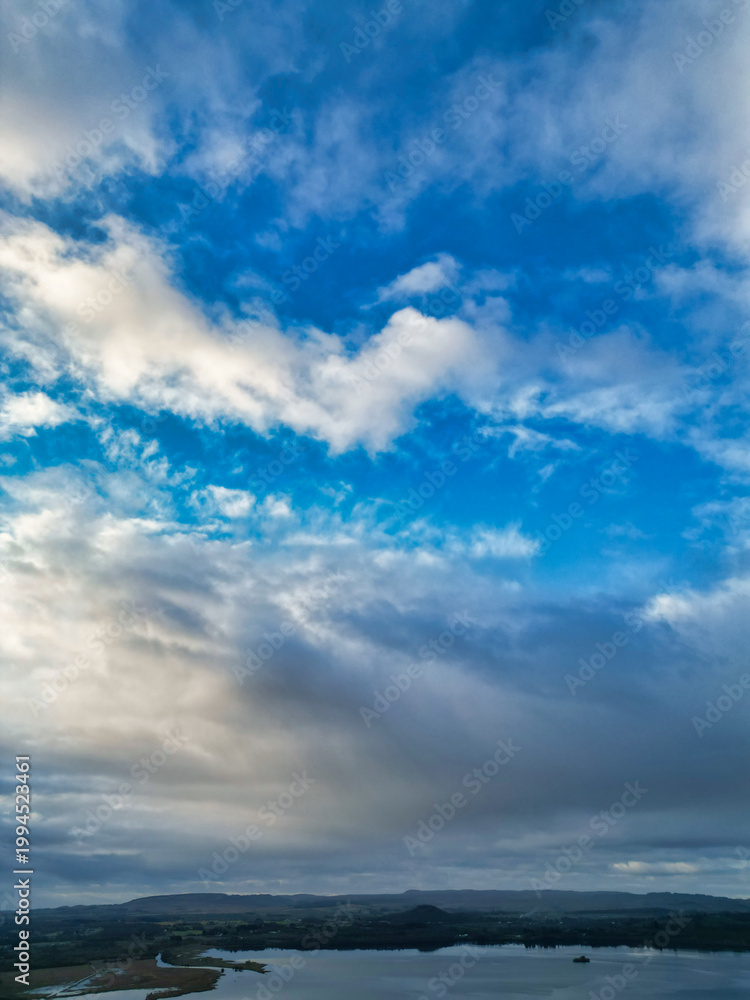 Obraz premium Gorgeous and Dramatic Sky and Clouds over Balhaha Valley Glasgow