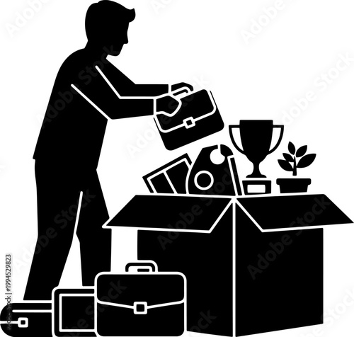 Silhouette of a man packing his belongings into a cardboard box after being fired