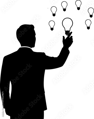 Silhouette of a businessman choosing a bright idea from a group of light bulbs