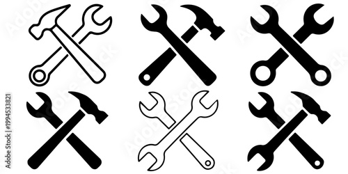 Crossed hammer and wrench tools icon set in silhouette and outline styles representing repair maintenance construction and mechanical service