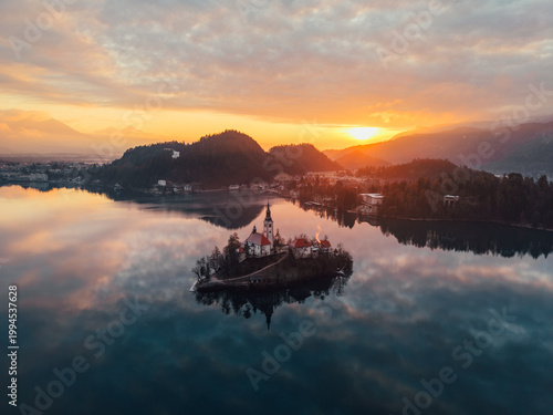 Canvas Print Aerial sunrise over Lake Bled with island church and mountains, Slovenia