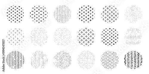 Collection of black and white circular fingerprint patterns on white background